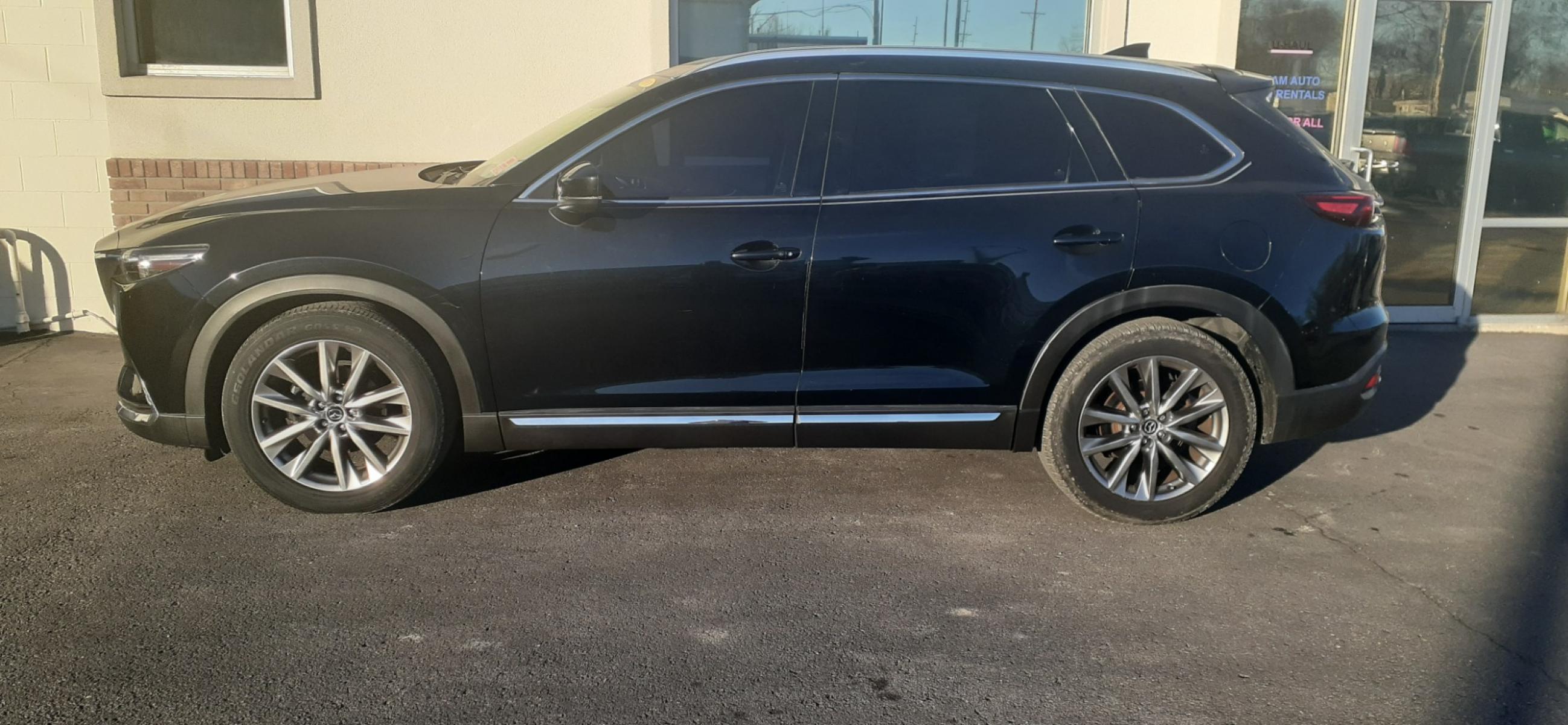2016 Mazda CX-9 Signature AWD (JM3TCBEY0G0) with an 2.5L L4 DOHC 16V engine, 6A transmission, located at 2015 Cambell Street, Rapid City, SD, 57701, (605) 342-8326, 44.066433, -103.191772 - Carfax available - Photo #0